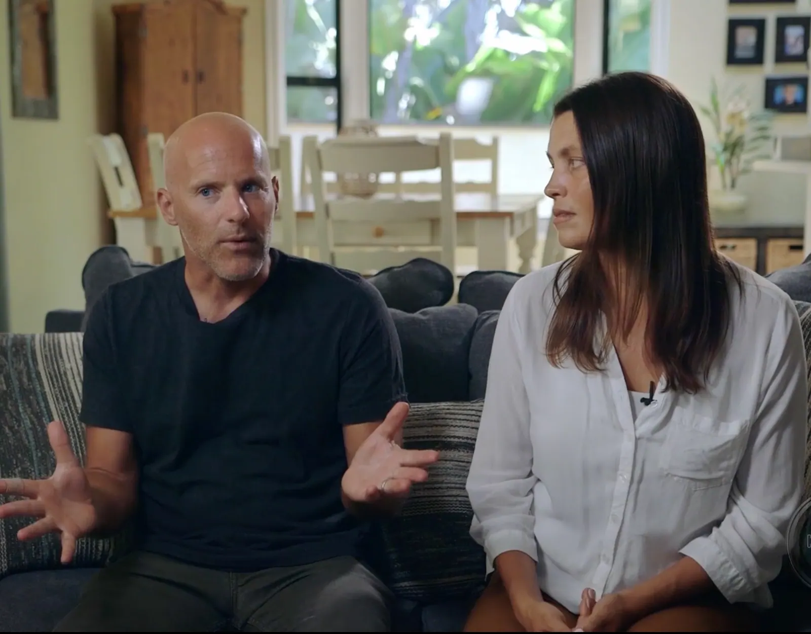 Two people in conversation during a filmed interview